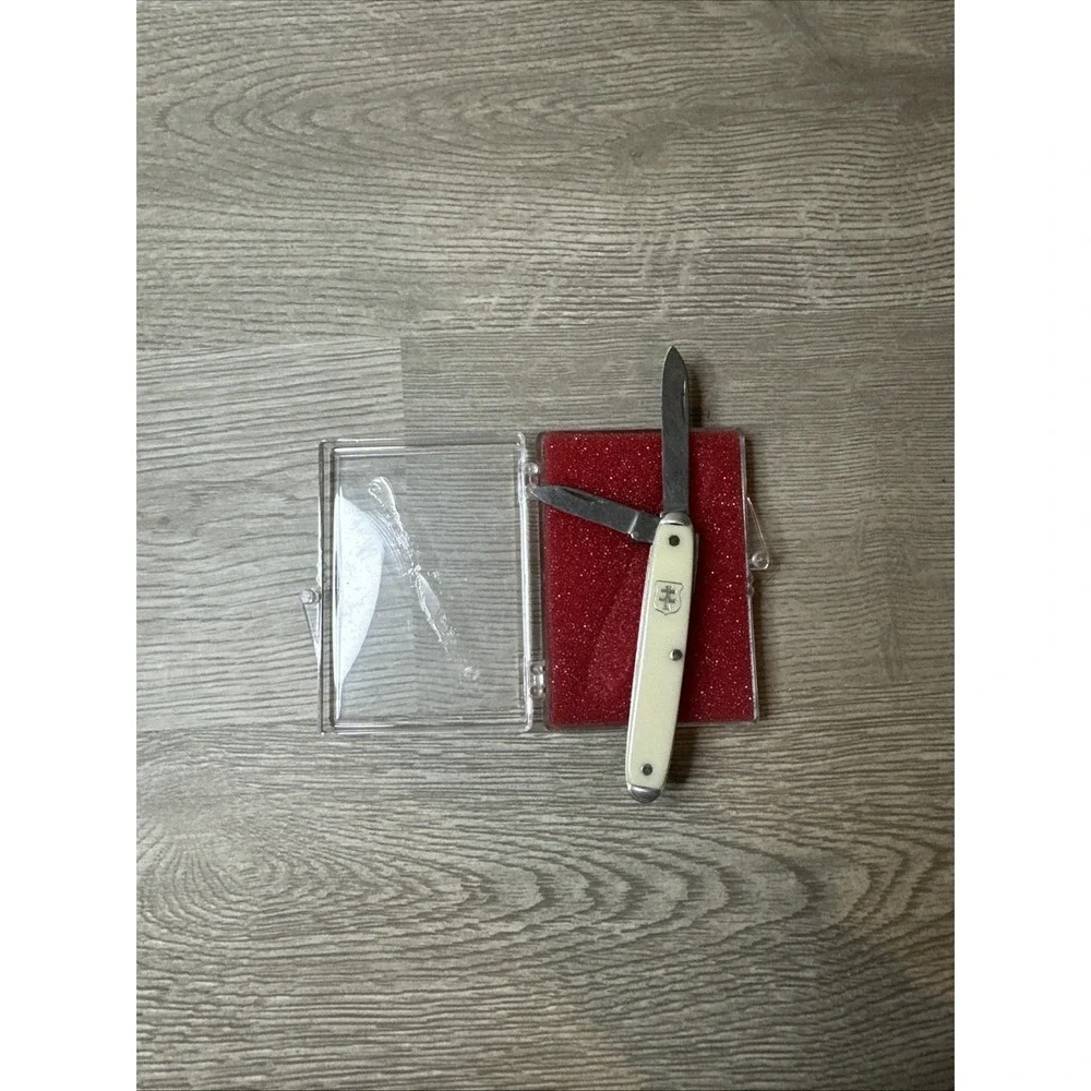 VTG.  2 BLADE KNIFE ADVERTISING SENTER-SANDERS‎ TRACTOR CORPORATION 